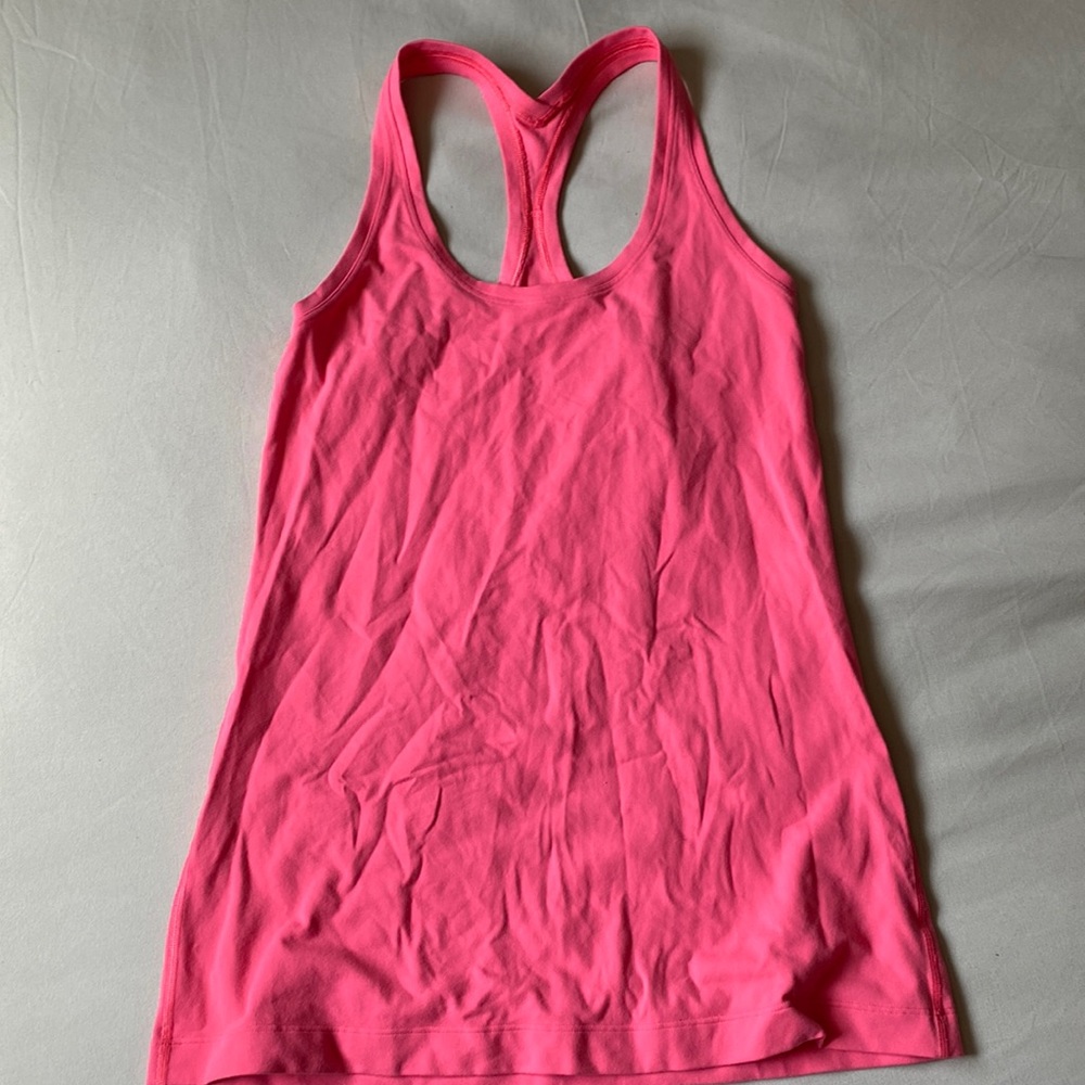 Lulu lemon pink tank top (no tag on but I believe it’s a size 8)